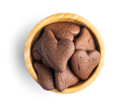 Heart shaped cookies in a bowl isolated on the white background.の写真素材