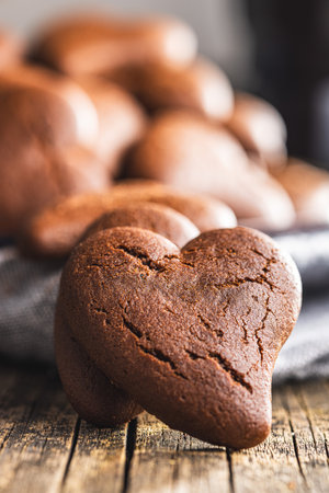 Heart shaped cookies on the wooden table.の写真素材