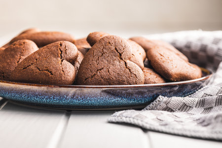 Heart shaped cookies on the plate.の写真素材