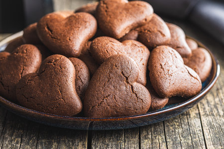 Heart shaped cookies on the plate.の写真素材