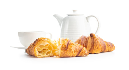Fresh butter croissant and coffee cup isolated on white background.の写真素材