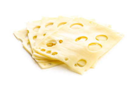 Slices of cheese isolated on the white background.の写真素材