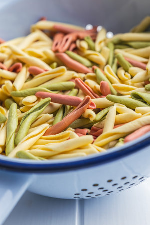 Fusilli Pugliese. Italian twisted pasta in the colander.の写真素材