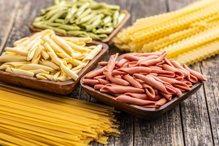 Fusilli Pugliese. Italian tricolor twisted pasta in the bowl.の写真素材