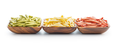 Fusilli Pugliese. Italian tricolor twisted pasta isolated on the white background.の写真素材