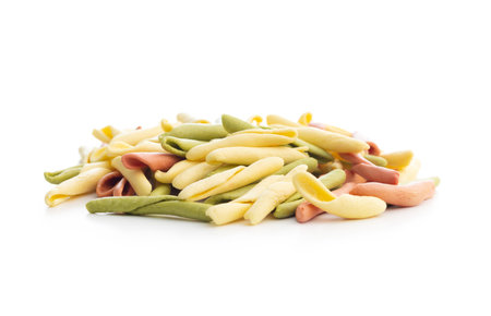 Fusilli Pugliese. Italian tricolor twisted pasta isolated on the white background.の写真素材