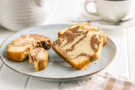 Marble sponge cake. Cake with cocoa and vanilla taste on the plate.の写真素材