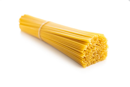 Spaghetti pasta. Uncooked italian pasta isolated on the white background.の写真素材