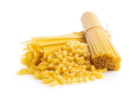 Spaghetti, mafaldine and macaroni pasta. Uncooked italian pasta isolated on the white background.の写真素材