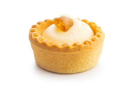 Sweet tartlets. Tasty mini tarts. Mini pie with cream isolated on the white background.の写真素材