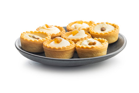 Sweet tartlets. Tasty mini tarts. Mini pie with cream isolated on the white background.の写真素材