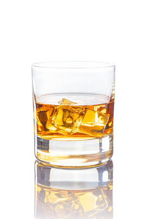 Glass of whiskey or other alcohol isolated on the white background.の写真素材