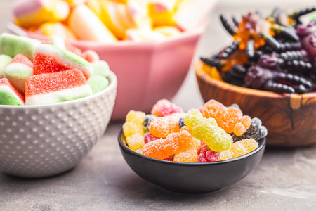 Sweet jelly candies in the bowls.の写真素材