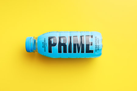 Prime Hydration Drink. Bottle drink on the yellow background.のeditorial素材