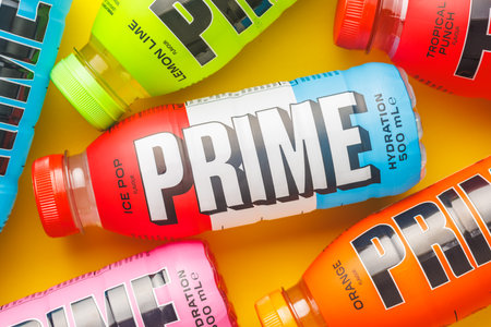 Prime Energy Drink. Bottle drink on the yellow background. Top view.のeditorial素材