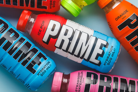 Prime Energy Drink. Bottle drink on the blue background. Top view.のeditorial素材