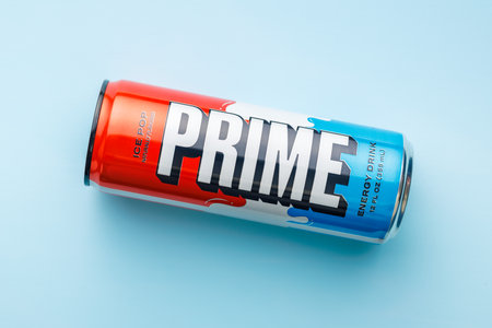 Prime Energy Drink. Bottle drink on the blue background. Top view.のeditorial素材