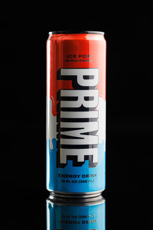 Prime Energy Drink. Bottle drink on the black table.のeditorial素材