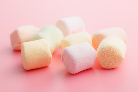 Sweet marshmallows candy on the pink background.の写真素材