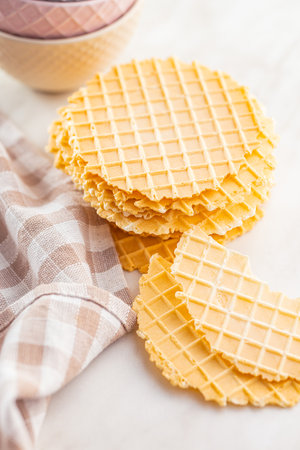 Round waffle biscuits on the kitchen table.の写真素材
