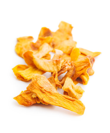 Dried mango fruit isolated on the white background.の写真素材