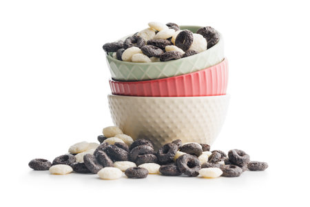 Sweet breakfast cereals in a bowl isolated on the white background.の写真素材