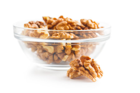 Peeled dried walnut kernels isolated on the white background.の写真素材