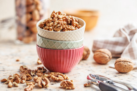 Peeled dried walnut kernels in the bowl.の写真素材