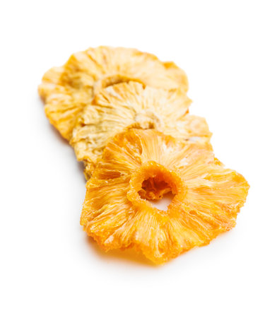 Dried pineapple rings isolated on the white background.の写真素材