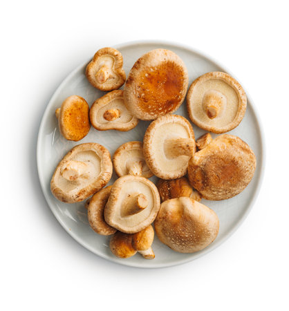 Fresh shiitake mushrooms isolated on the white background.の写真素材