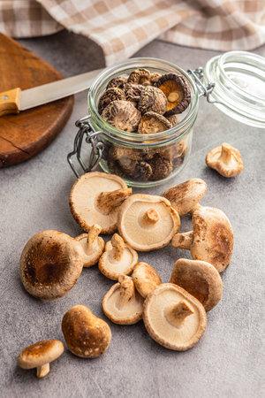 The fresh shiitake mushrooms on the kitchen table.の写真素材