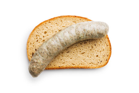 White pudding sausage. Pork product and bread isolated on the white background.の写真素材