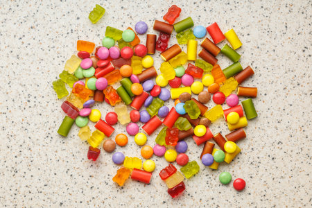 Colorful sweet jelly candies on the kitchen table. Top view.の写真素材