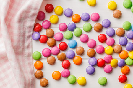 Colorful sweet candies on the white table. Top view.の写真素材