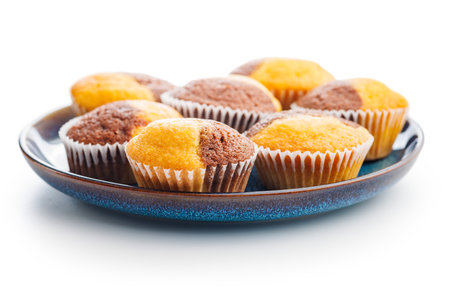 Close Up of a Muffins on a plate isolated on a white background.の写真素材