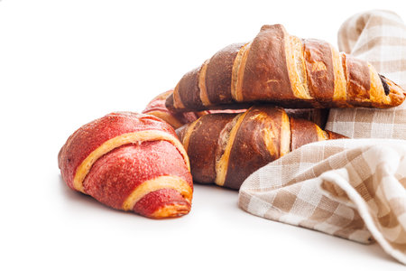 Freshly Baked Fruity and Chocolate Croissants Isolated Against a White Backgroundの写真素材