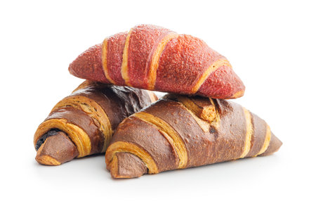 Freshly Baked Fruity and Chocolate Croissants Isolated Against a White Backgroundの写真素材