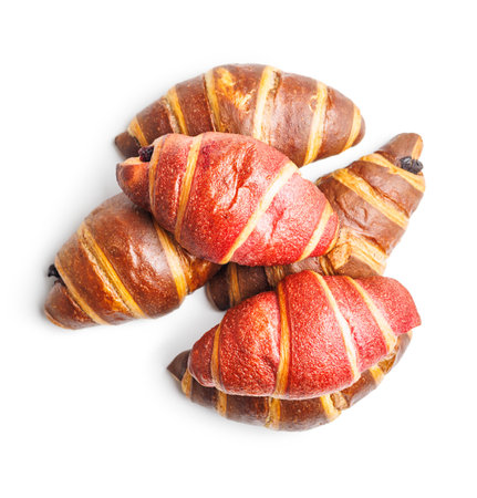Freshly Baked Fruity and Chocolate Croissants Isolated Against a White Backgroundの写真素材