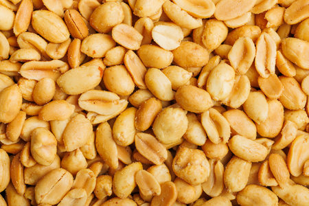 Detailed view of peanuts piled together. Top view.