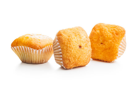 Magdalenas the typical Spanish plain muffins isolated on a white background.の写真素材