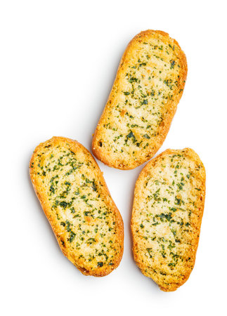 Garlic crisp bread Slices Topped With Herbs isolated on a white background.の写真素材