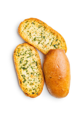 Garlic crisp bread Slices Topped With Herbs isolated on a white background.の写真素材