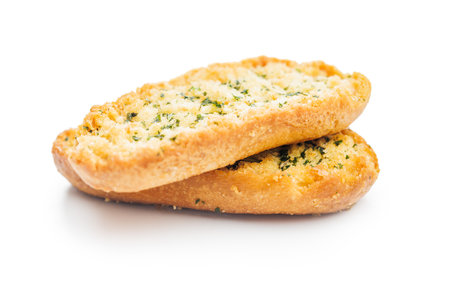 Garlic crisp bread Slices Topped With Herbs isolated on a white background.の写真素材