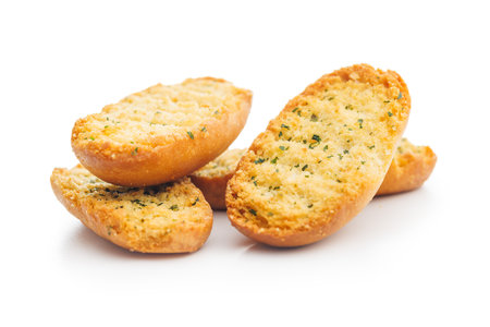 Garlic crisp bread Slices Topped With Herbs isolated on a white background.の写真素材