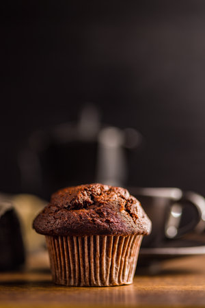 Sweet muffin cakes on a wooden table.の写真素材