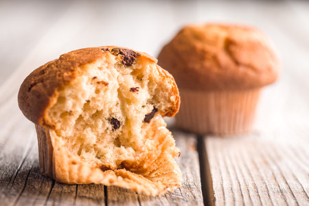Sweet muffin cakes. Cupcakes on a wooden table.の写真素材