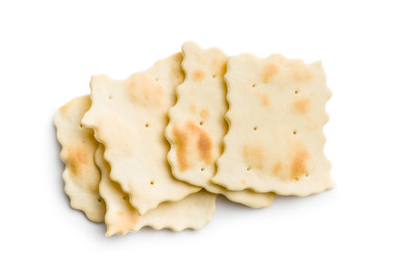 A crispy salted crackers isolated on a white background.の写真素材