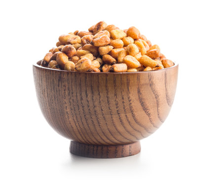 Roasted salted corn snack in bowl isolated on a white background.の写真素材