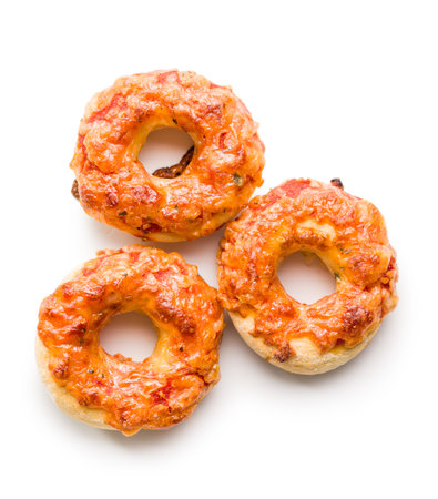 Mini pizza bagels isolated on a white background.の写真素材