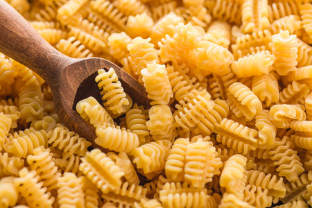 Uncooked italian pasta. And Radiatori paste.の写真素材